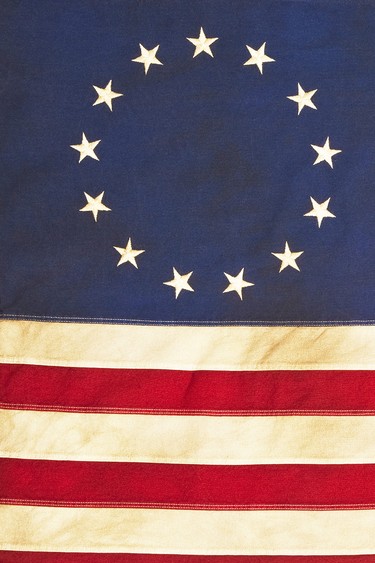 Betsy Ross American Revolution flag with thirteen stars.