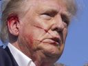 Republican presidential candidate former President Donald Trump is moved from the stage at a campaign rally, Saturday, July 13, 2024, in Butler, Pa.