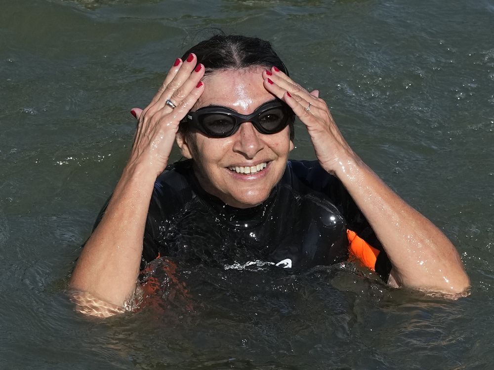 NextImg:Paris mayor swims in the Seine, declares it clean for the Olympics