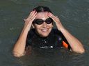 Paris Mayor Anne Hidalgo swims in the Seine river Wednesday, July 17, 2024 in Paris.