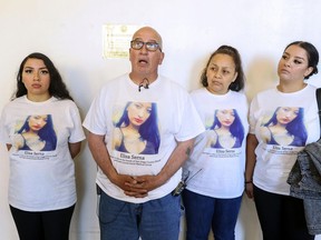 FILE - Elisa Serna's family members, from left, Star Serna, Michael Serna, Paloma Serna, and Deana Serna speak to the media at the El Cajon courthouse on Wednesday, Oct. 26, 2022, in El Cajon, Calif. San Diego County will pay nearly $15 million to settle a lawsuit by the family of Elisa Serna a 24-year-old pregnant woman who died in jail after a sheriff's deputy and medical worker watched her collapse in a cell five years ago.