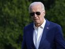 President Joe Biden walks across the South Lawn of the White House in Washington, Sunday, July 7, 2024, after returning from a trip to Pennsylvania.