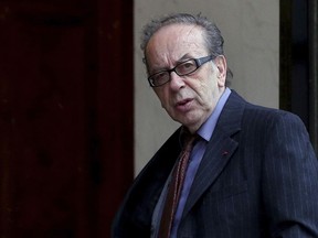 FILE - Albanian novelist Ismail Kadare arrives at the Elysee Palace to receive the France's Legion d'Honneur medal by French President Francois Hollande, in Paris, on May 30, 2016. Renowned Albanian novelist Kadare has died after being rushed to a hospital in the Albanian capital, his publishing editor said on Monday. He was 88.