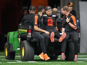 B.C. Lions' Josh Woods is driven off the field after being injured during the first half of a CFL football game against the Edmonton Elks, in Vancouver, on Thursday, June 27, 2024. A key defensive weapon for the B.C. Lions has seen had his season cut short by a knee injury.