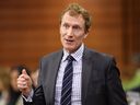 Immigration, Refugees and Citizenship Minister Marc Miller rises during Question Period, Thursday, Feb. 8, 2024.