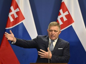 FILE - Slovakia's Prime Minister Robert Fico speaks during a press conference with Hungary's Prime Minister Viktor Orban at the Carmelite Monastery in Budapest, Hungary, Jan. 16, 2024. Slovakia's highest legal authority ruled on Wednesday, July 3, 2024 that the key provisions of the recently amended penal code drafted by the government of populist Prime Minister Robert Fico are in line with the Constitution.