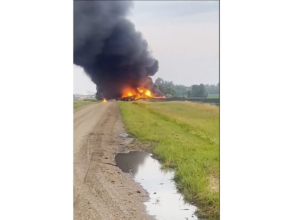 NextImg:Rail cars carrying hazardous material derail and catch fire in North Dakota