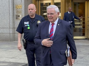 FILE - U.S. Sen. Bob Menendez, D-N.J., leaves federal court following the day's proceedings in his bribery trial, Tuesday, June 18, 2024, in New York. The sister of Sen. Menendez has come to her brother's defense as the first witness called by his lawyers in the bribery case against Menendez and two New Jersey businessmen. Caridad Gonzalez testified Monday, July 1, three days after prosecutors rested.