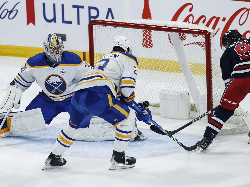 NextImg:Jets lose four players, including defenceman Dillon, as free agency opens