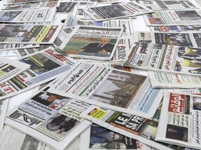 FILE - Newspapers are seen on a table at a private television broadcaster in Algiers, Tuesday, March 19, 2024. Algeria's moves to restrict freedom of expression are showing few signs of slowing as September's presidential elections near. Authorities last week arrested journalists in several separate instances, raiding a bookstore in a region known for dissent and protest and taking into detention two journalists who published a video showing women criticizing the government.