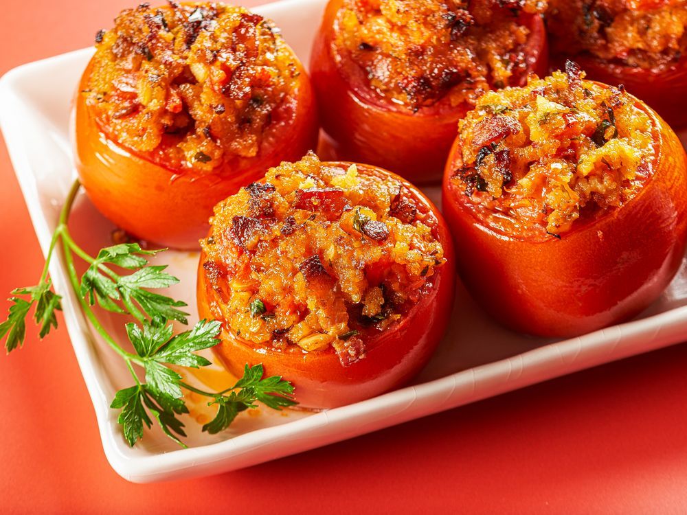NextImg:Stuff tomatoes with garlicky breadcrumbs and bacon for a flavour jackpot