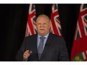 Ontario PC leader Doug Ford speaks to the media regarding the cost of firing the board and CEO of Ontario Hydro a week after he declared at a press conference that the firings would be his first act if elected Premier of Ontario in the next election. Toronto, Ont. on Thursday April 19, 2018. Stan Behal/Toronto Sun/Postmedia Network