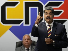 Venezuelan President Nicolas Maduro speaks after signing an agreement to respect the results of the upcoming presidential elections, at the National Electoral Council headquarters in Caracas, Venezuela, Thursday, June 20, 2024.