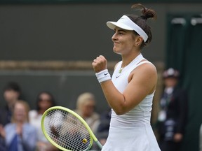 Bianca Andreescu of Canada reacts after winning a point against Linda Noskova of the Czech Republic during their match on day three at the Wimbledon tennis championships in London, Wednesday, July 3, 2024.