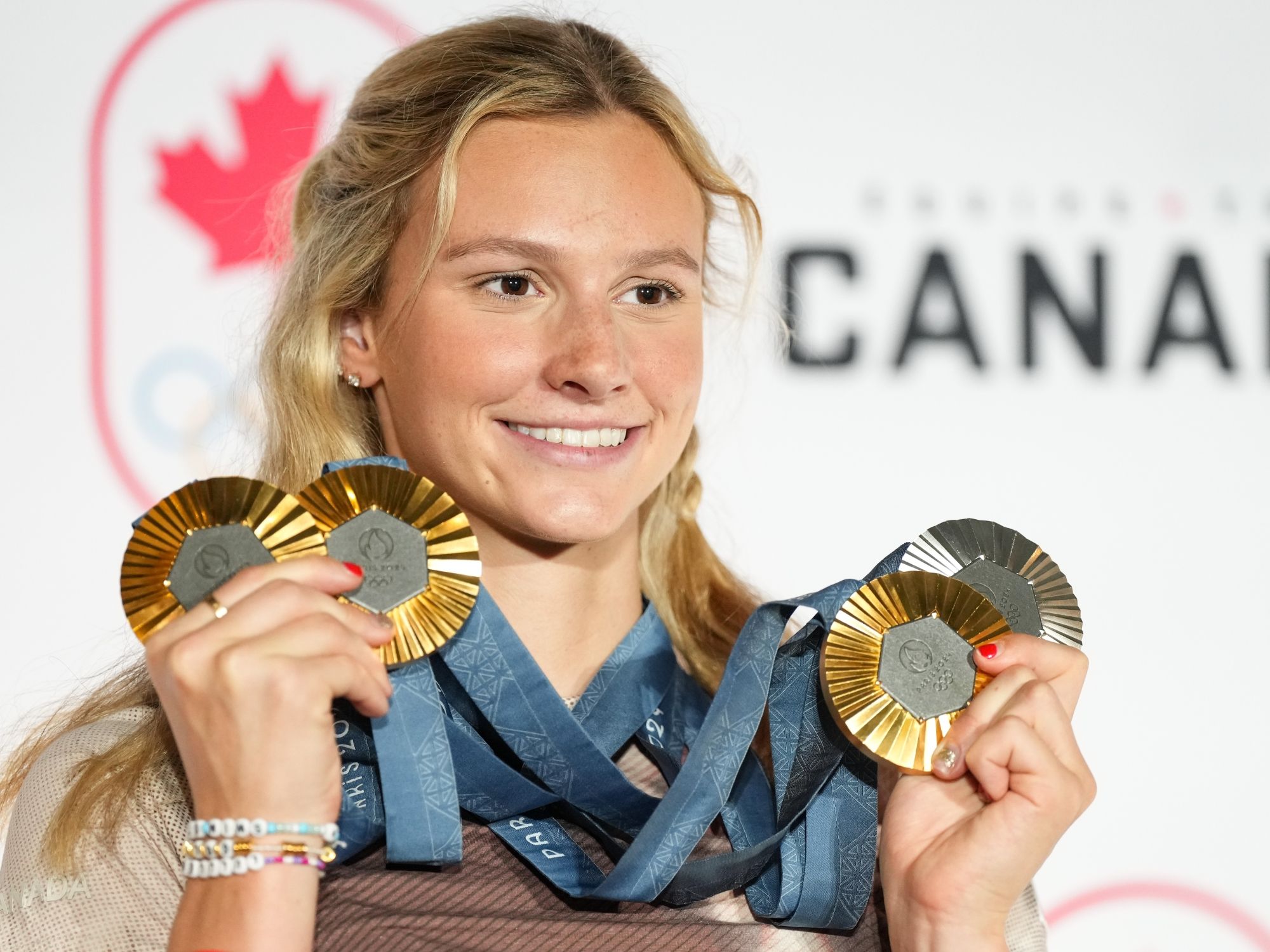 NextImg:Simmons: Summer McIntosh isn't just a Canadian legend, she's now an all-time Olympic great