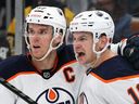 FILE: Zach Hyman #18 of the Edmonton Oilers celebrates with Connor McDavid #97 after scoring a goal against the Boston Bruins during the second period at TD Garden on November 11, 2021 in Boston, Massachusetts.