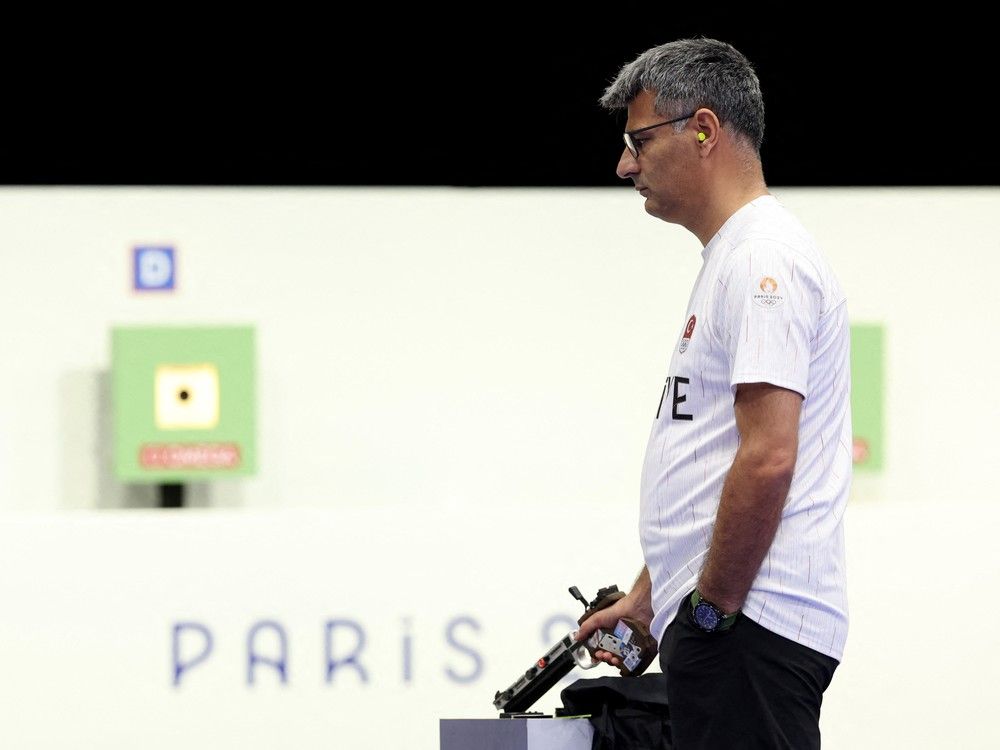NextImg:Meet the 51-year-old who won an Olympic silver medal dressed like your high school science teacher