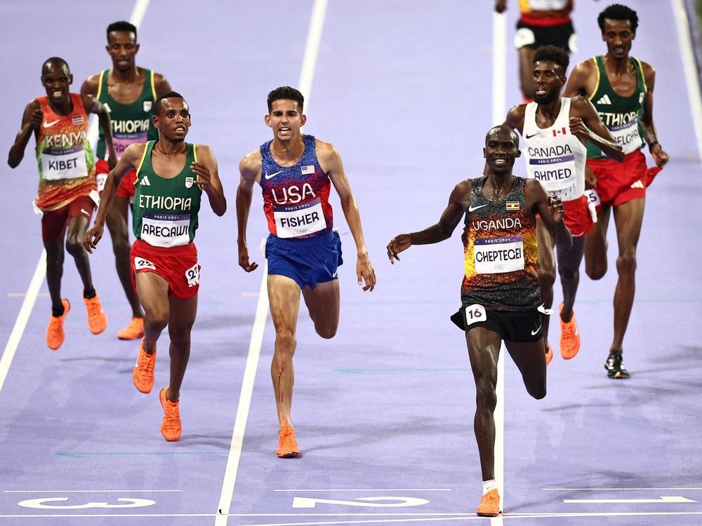 NextImg:Canada's Moh Ahmed finishes fourth in Olympic 10,000-metre race, less than a second back from gold