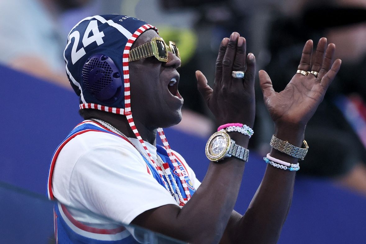 NextImg:Rap legend Flavor Flav helps Olympic discus star pay rent