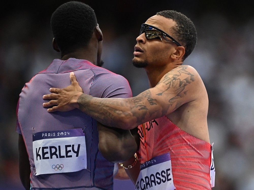 NextImg:COC revokes accreditation of Andre De Grasse's coach