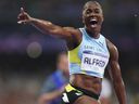 Julien Alfred of Team Saint Lucia celebrates winning the gold medal during the Women's 100m Final.