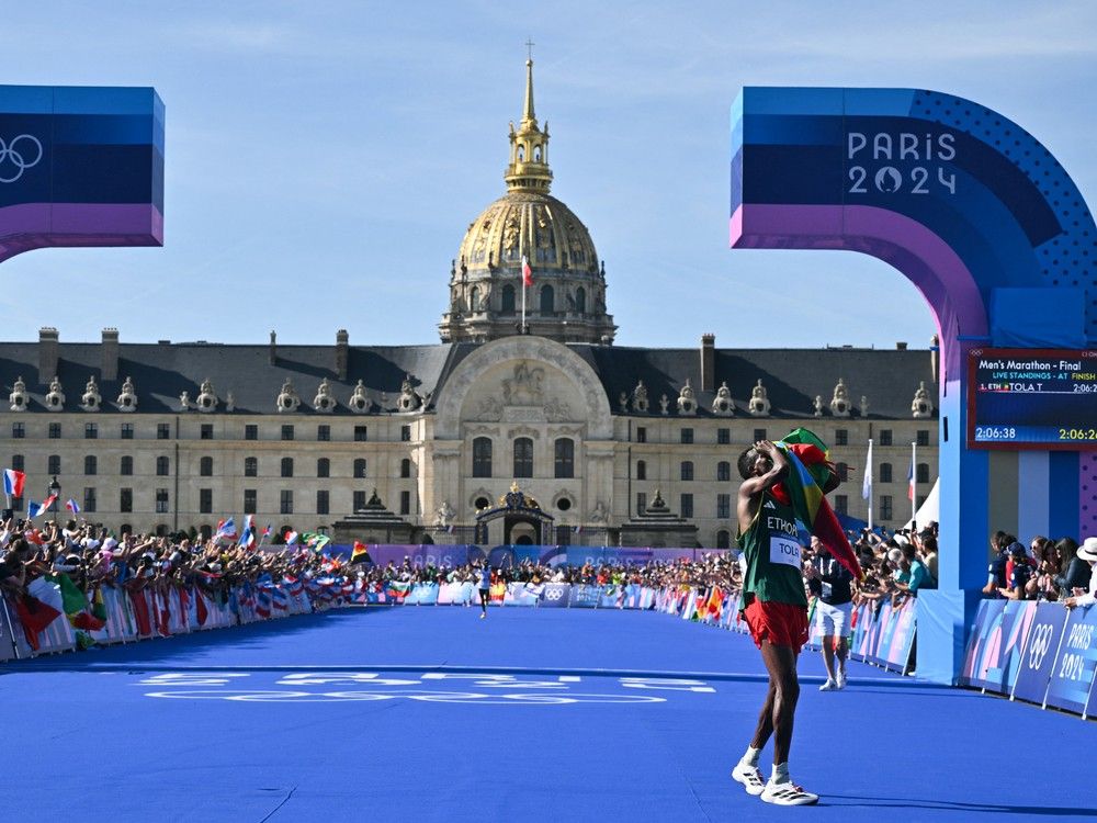 NextImg:Olympic marathon champion Tamirat Tola was a late addition to Ethiopian team