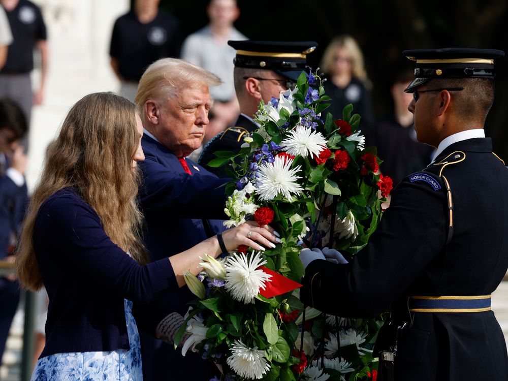 NextImg:Trump visit to Arlington National Cemetery turns controversial after 'incident' over prohibited photos