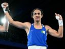 Algeria's Imane Khelif celebrates after beating Thailand's Janjaem Suwannapheng in the women's 66kg semi-final boxing match during the Paris 2024 Olympic Games.