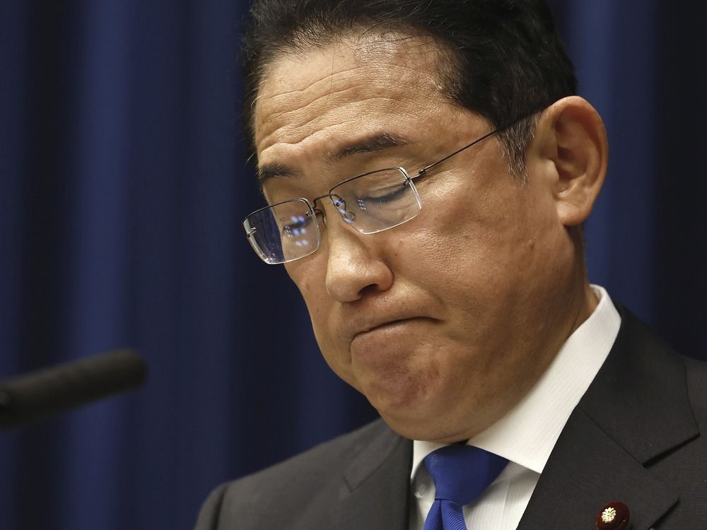 NextImg:Japan's Prime Minister says he will not run again in September