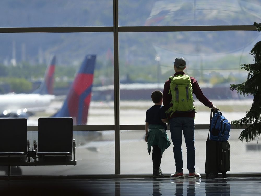 NextImg:Proposed rule would ban airlines from charging parents to sit with their children