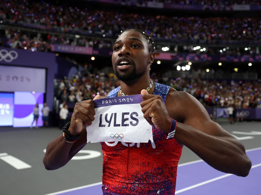 NextImg:Noah Lyles wins in the closest Olympic 100m finish in modern history