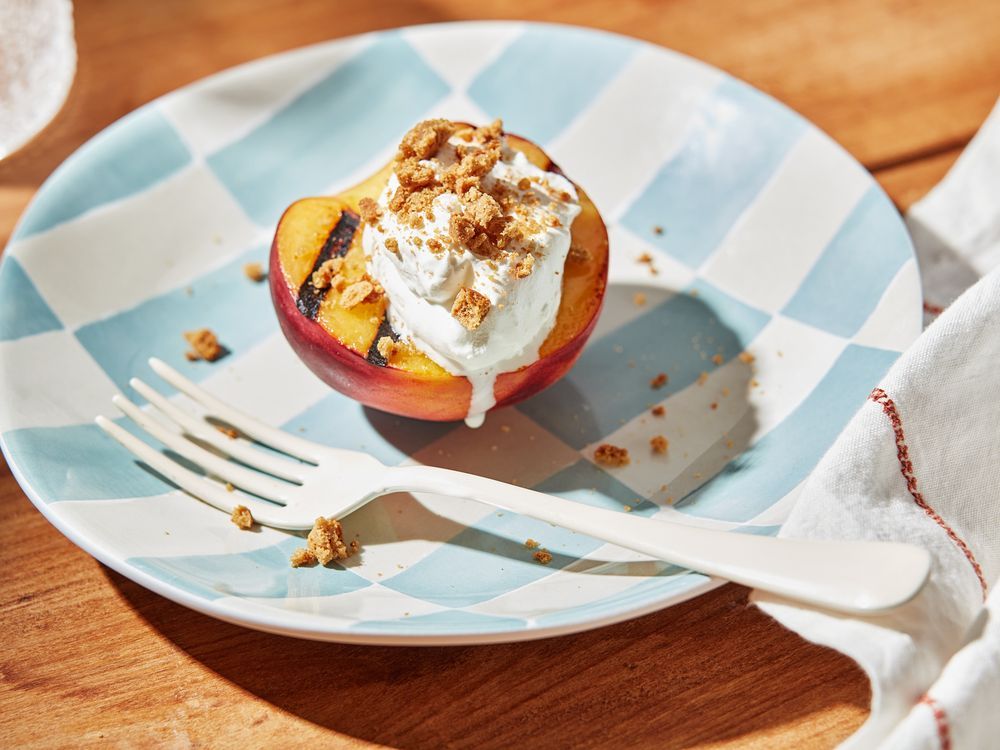 NextImg:Top grilled peaches with mascarpone for a low-effort summer dessert