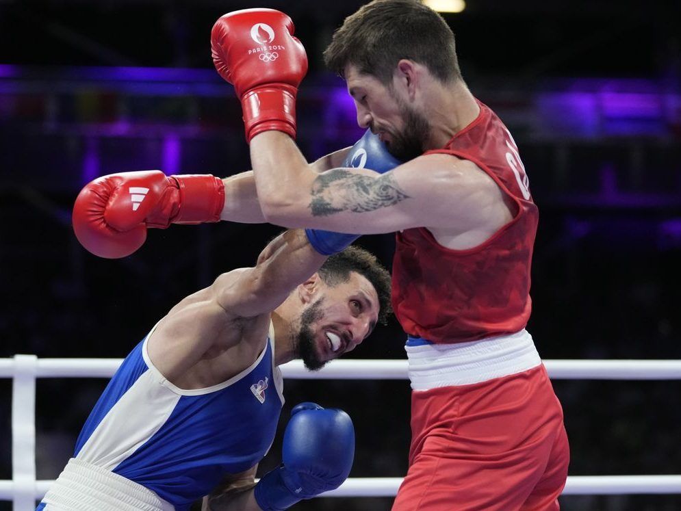 NextImg:Bronze in hand, boxer Wyatt Sanford headed for the happiest place on Earth