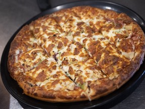 An all-dressed pizza from Houston Pizza's Quance Street location in Regina, Saskatchewan.