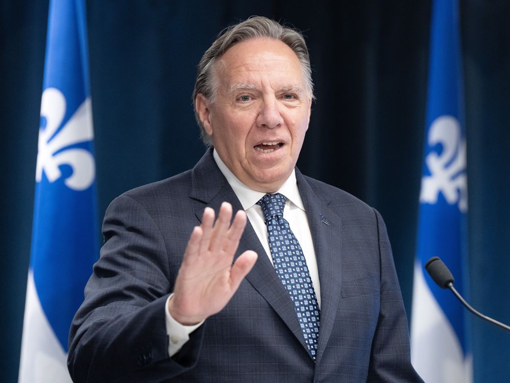 NextImg:Legault announces six-month freeze on some temporary foreign workers in Montreal