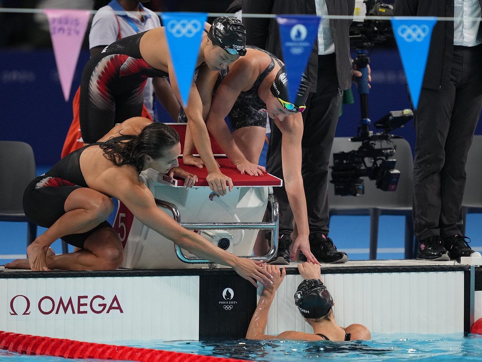 NextImg:Weary Summer McIntosh surpassed in final leg as Canadian women fade to fourth in 4x100 relay