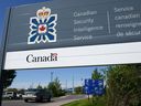 A sign for the Canadian Security Intelligence Service building is shown in Ottawa on May 14, 2013.