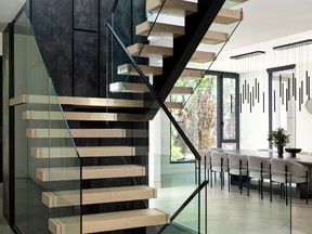 With its joinery and support structure concealed, the staircase seems to float in mid-air.
