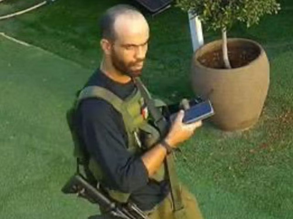 NextImg:Hamas terrorist seen drinking cola after deadly Oct. 7 grenade attack on family killed by Israeli military