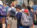 Social media video shows students on a field trip marching in a rally where the crowd's chanting,