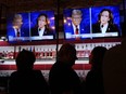 The debate is shown on TVs