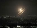 This picture taken from the West Bank city of Hebron shows projectiles above the Israeli city of Ashdod on Oct. 1, 2024.