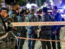 Israeli border guards deploy at the scene of a shooting attack along Jersalem Boulevard in Jaffa south of Tel Aviv on Oct. 1, 2024.