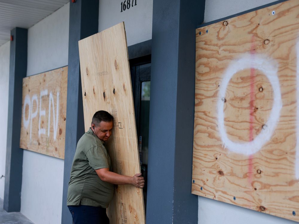 NextImg:'It's a ghost town around here': Milton approaches Florida as a Category 4 hurricane