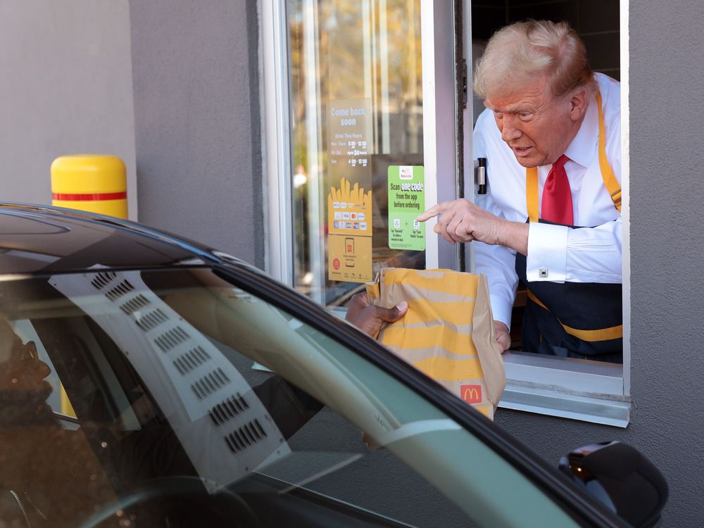 NextImg:McDonald's reveals who it supports after Trump mocks Harris by working at a drive-thru