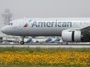 An American Airlines jet taxis at the Los Angeles International Airport on April 12, 2024.