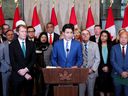 Prime Minister Justin Trudeau and members of his caucus hold a press conference on Parliament Hill in Ottawa on Thursday, Oct. 24, 2024.