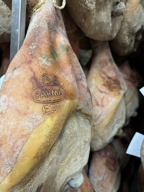 Seeing (and smelling) parma ham processing.