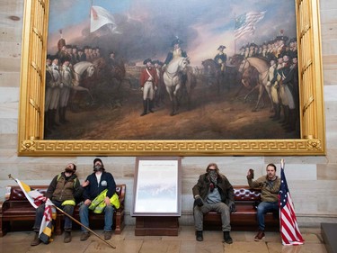 Jan. 6 protesters in the Rotunda at the Capitol