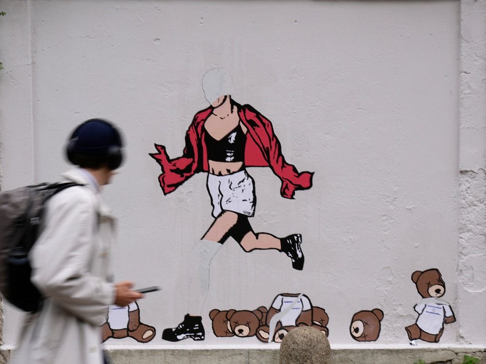 NextImg:Defaced mural of October 7 survivor a sign of rising antisemitism in Italy